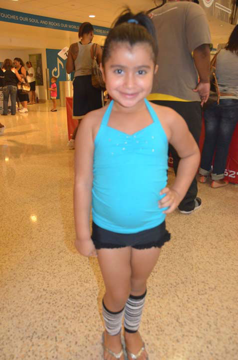 Two young dancers are lined up to audition for...